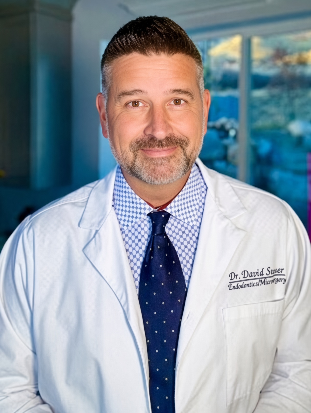 Dr. Dave Steuer, D.M.D., Ph.D., the Harvard-trained endodontist who formulated ILUMI, in his lab coat