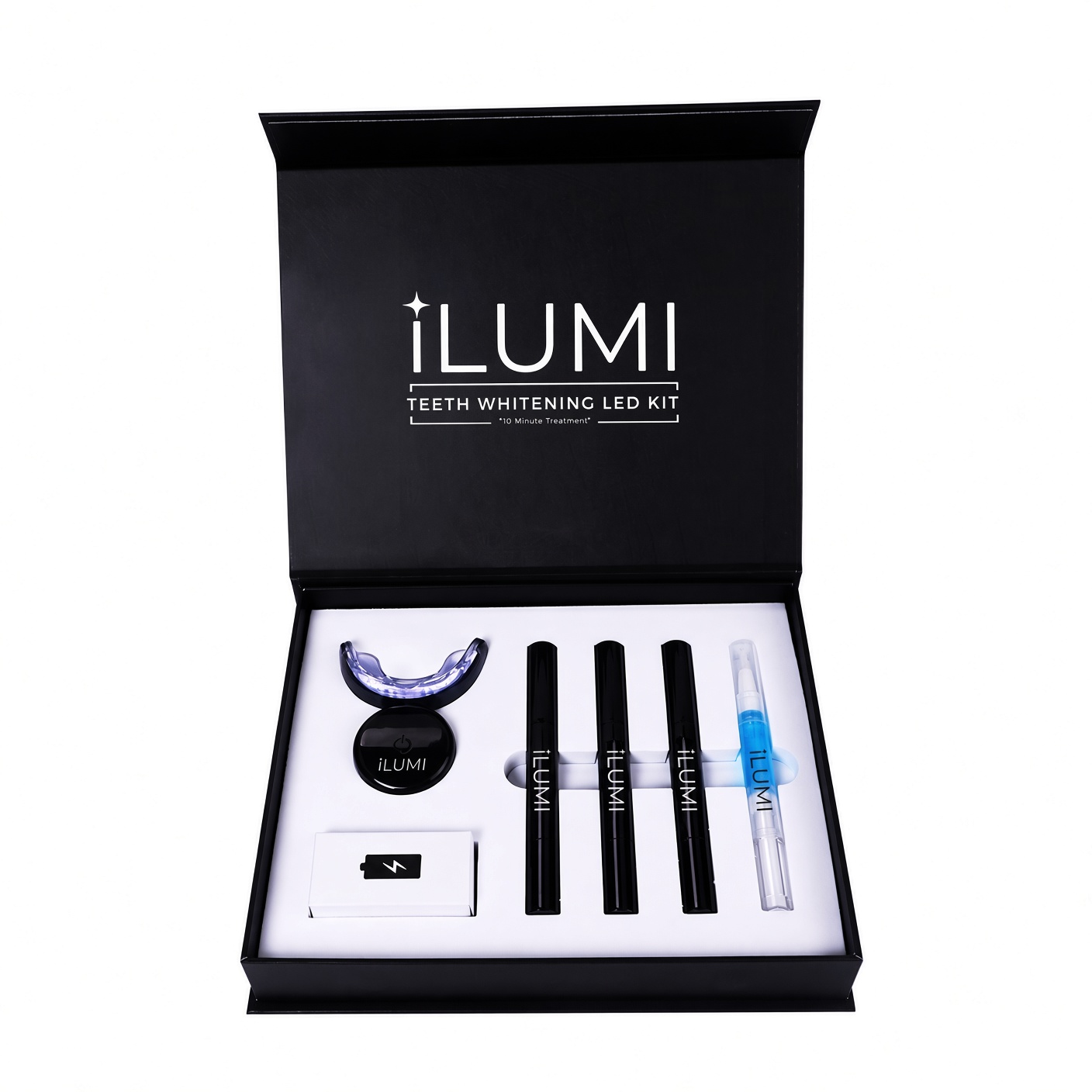 ILUMI LED Teeth Whitening Kit — open presentation box with LED mouth tray and gel pens